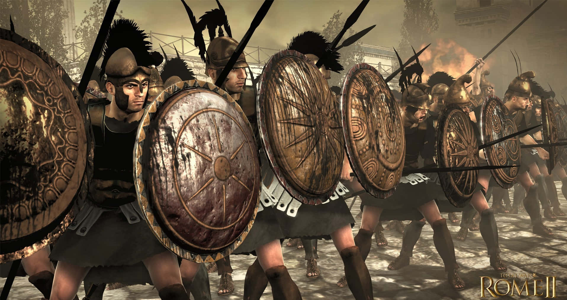 《Total War：羅馬2》戰略大戰場 壁紙 — 羅馬軍團士兵以陣型前進，手持長矛和圓盾，在塵土飛揚的戰場場景中。