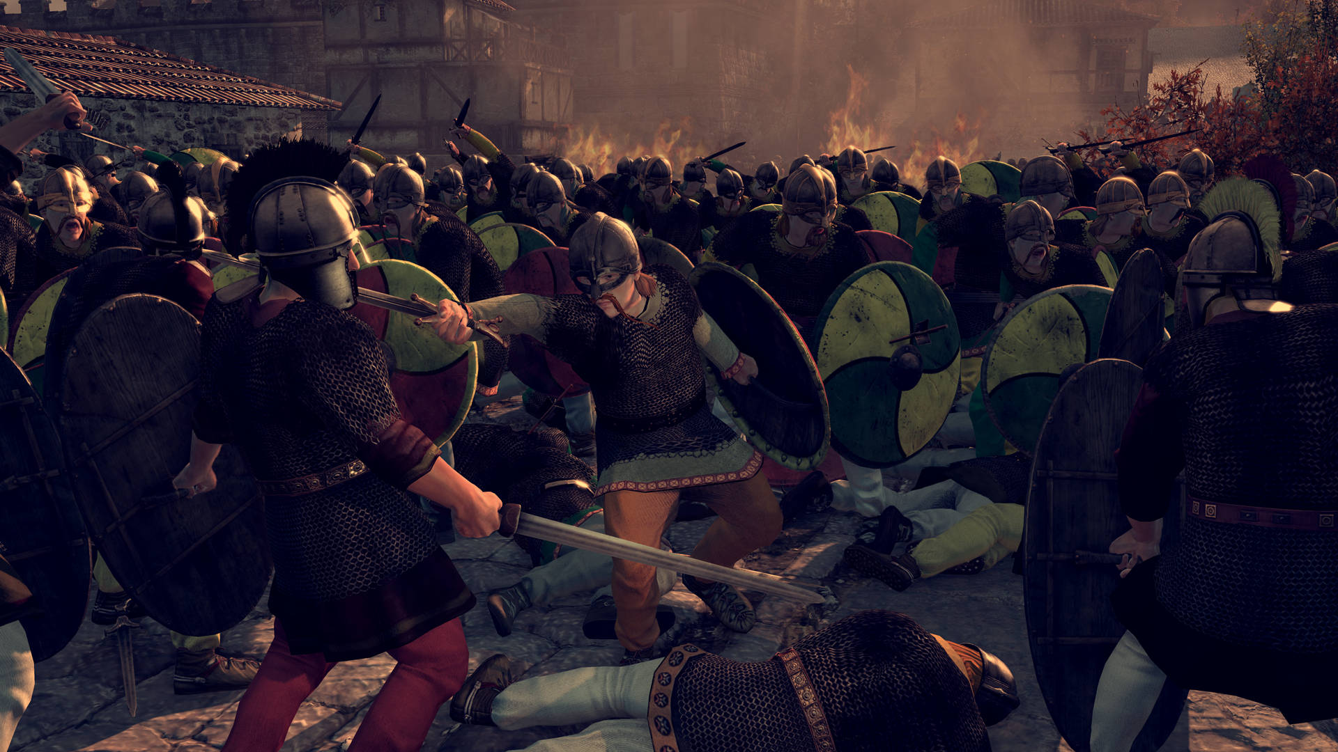 Total War：阿提拉 士兵大混戰 壁紙 — 羅馬士兵在燃燒的建築物和倒下的戰友中，用劍和盾牌進行殘酷的近戰衝突。