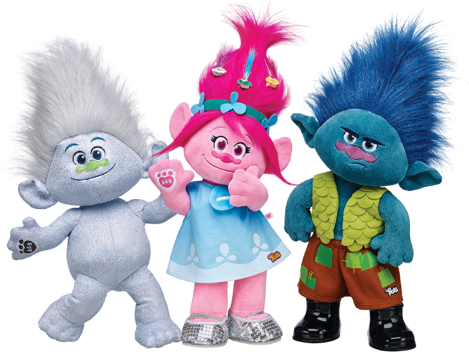小 trolls 角色玩具 壁紙 — 三個色彩繽紛的巨魔毛絨玩具，擁有蓬鬆的頭髮和富有表情的臉龐，一起站在黑色背景前。