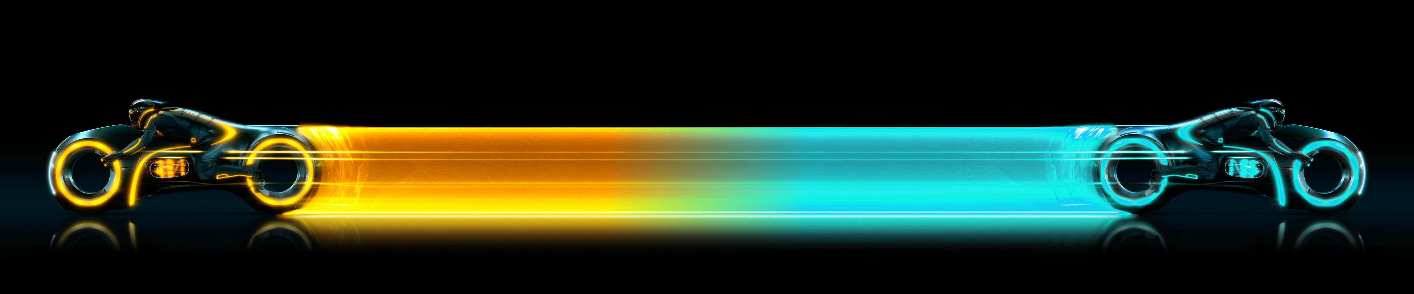 Tron 電影經典：黃藍光速車 Pixel 3 監視器背景 壁紙 — 兩輛發光的未來感電單車在黑色背景上沿著充滿活力的霓虹漸變賽道並排競速。