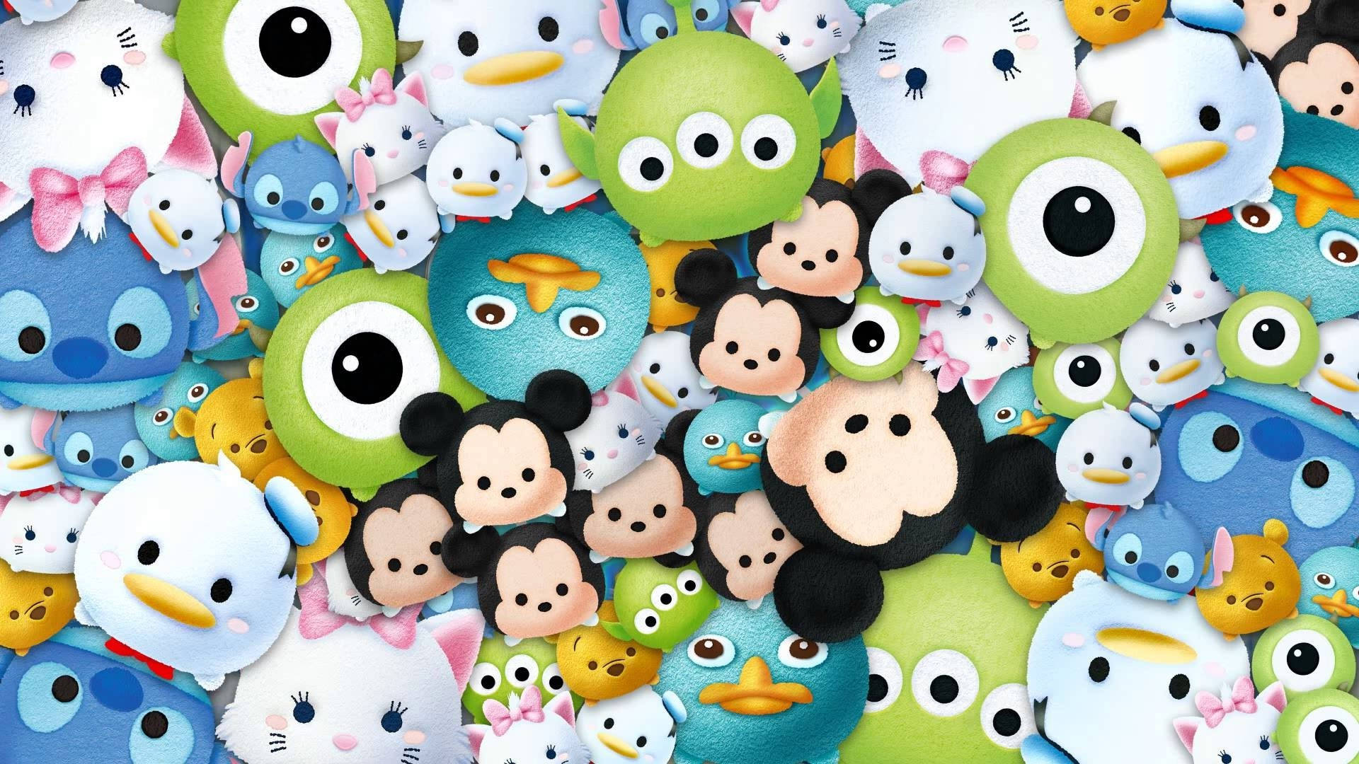 Tsum Tsum 外星人 壁紙 — 一幅密集、色彩繽紛的迪士尼 Tsum Tsum 毛公仔角色拼貼畫，展現各種姿勢和表情。