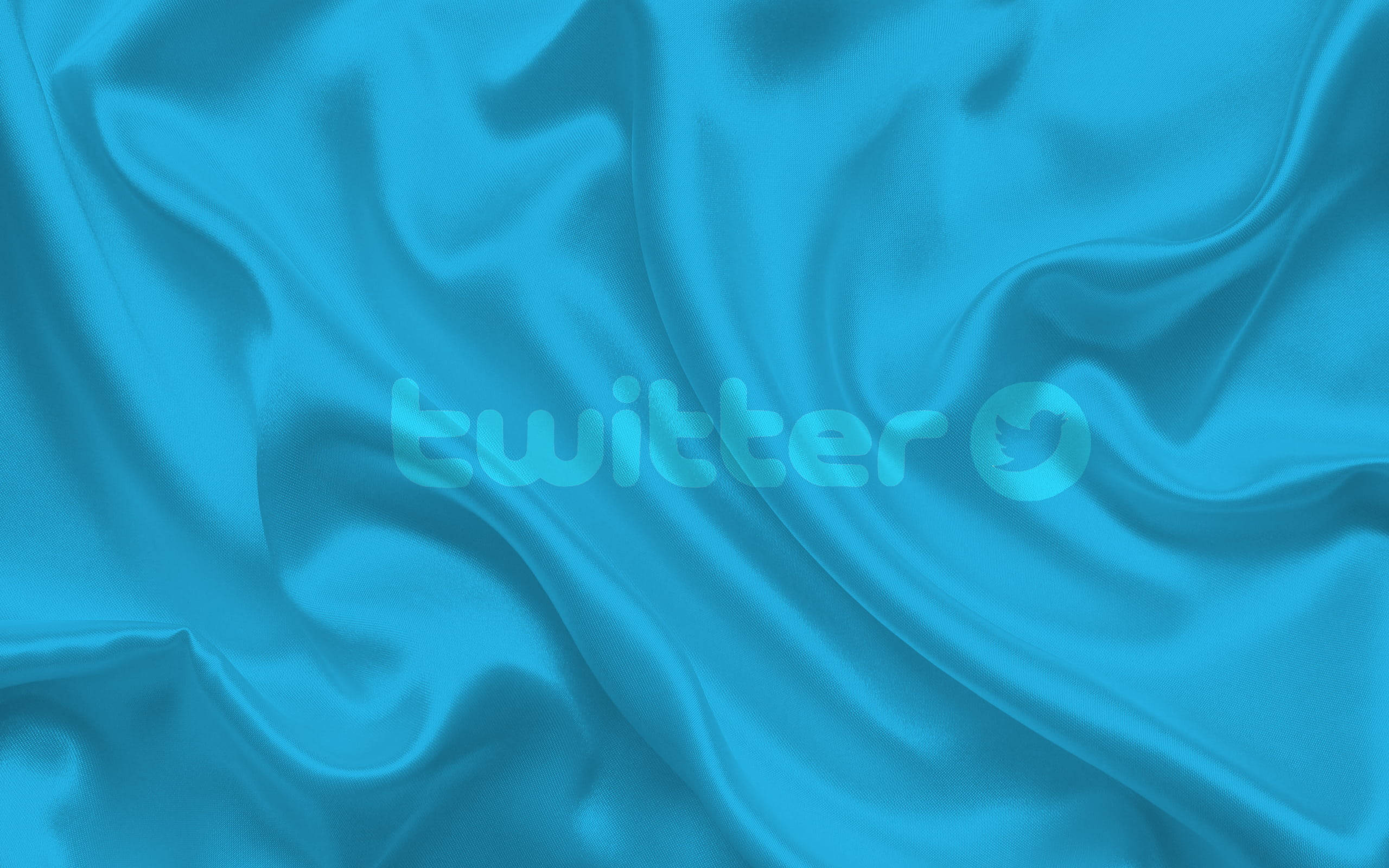 Twitter絲絨藍色壁紙 壁紙 — 豪華的青色緞面布料，帶有流動的褶皺和柔和的高光，營造出光滑優雅的質感。