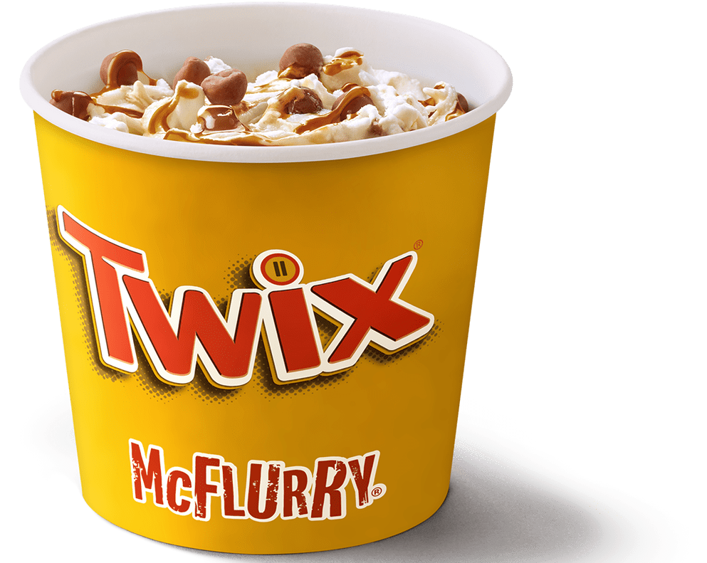 麥當勞 Twix McFlurry 壁紙 — 一個鮮黃色的Twix McFlurry杯，上面有焦糖漩渦和朱古力塊，襯托在純白背景上。
