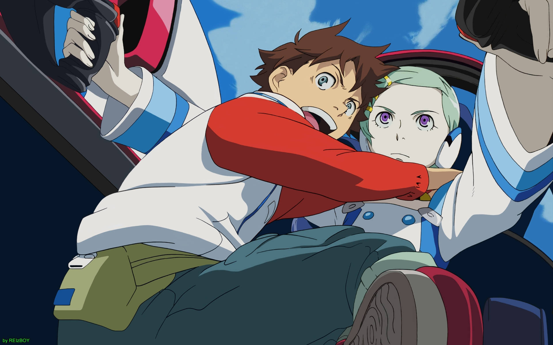《Eureka Seven》搞笑情侶組合 壁紙 — 兩個動漫角色在賽車駕駛艙中，在高速比賽中表現出強烈的專注和驚訝。