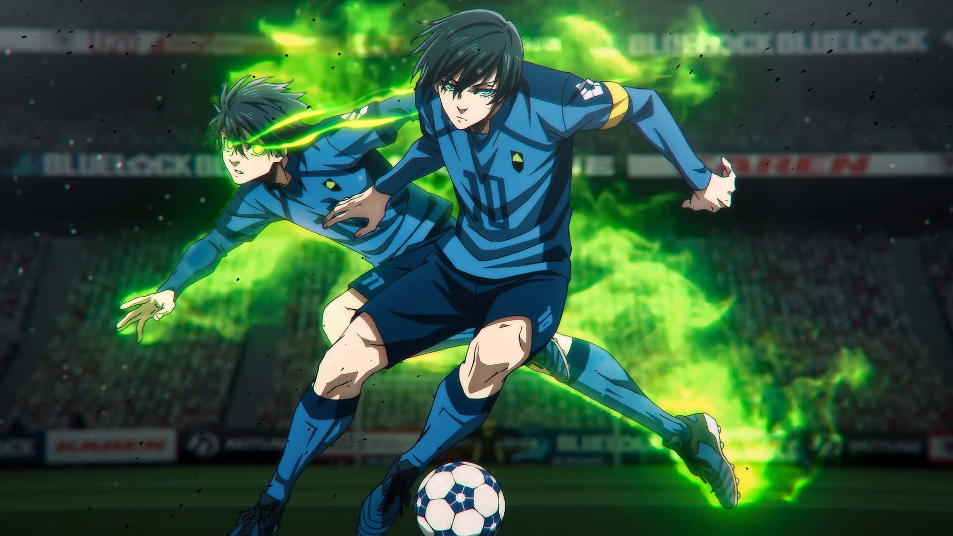  壁紙 — 兩名身穿藍色球衣的動漫足球員在體育場上激烈對戰，伴隨著發光的綠色能量效果。