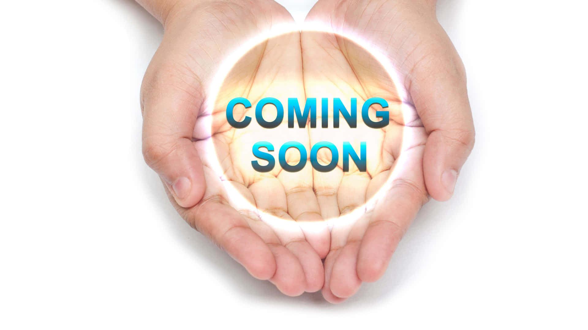 手捧著一個帶有「COMING SOON」文字的發光球體。