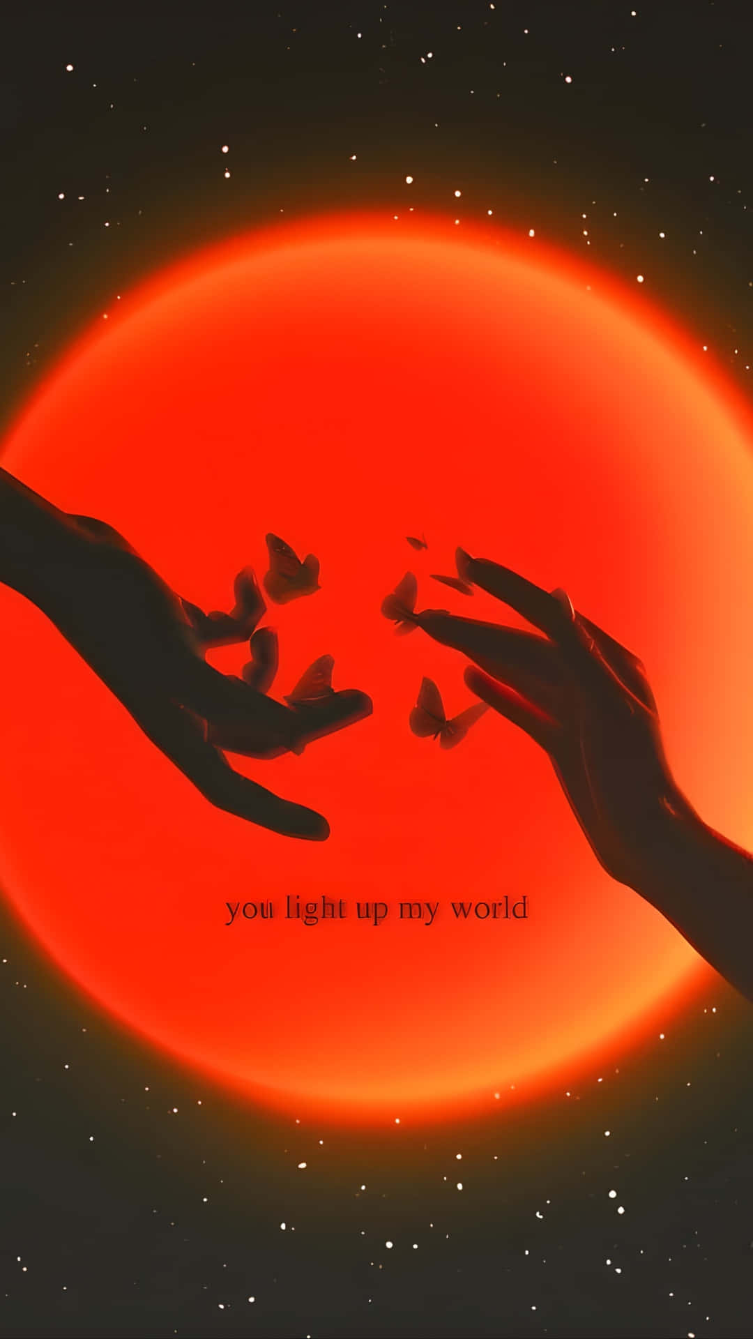  壁紙 — 兩隻剪影的手穿過發光的紅太陽互相伸向對方，蝴蝶在它們之間飄浮，背景是繁星點點的夜空。