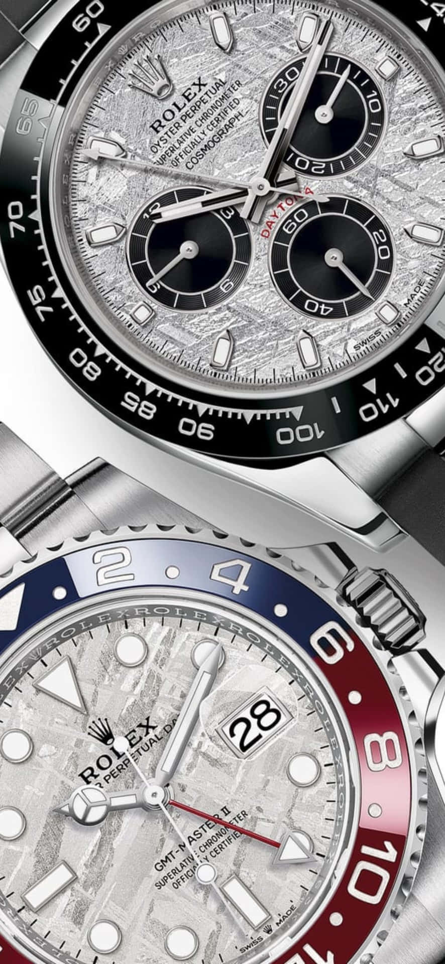  壁紙 — 兩枚 Rolex 計時碼錶，銀色錶盤，對比色錶圈，垂直疊放。
