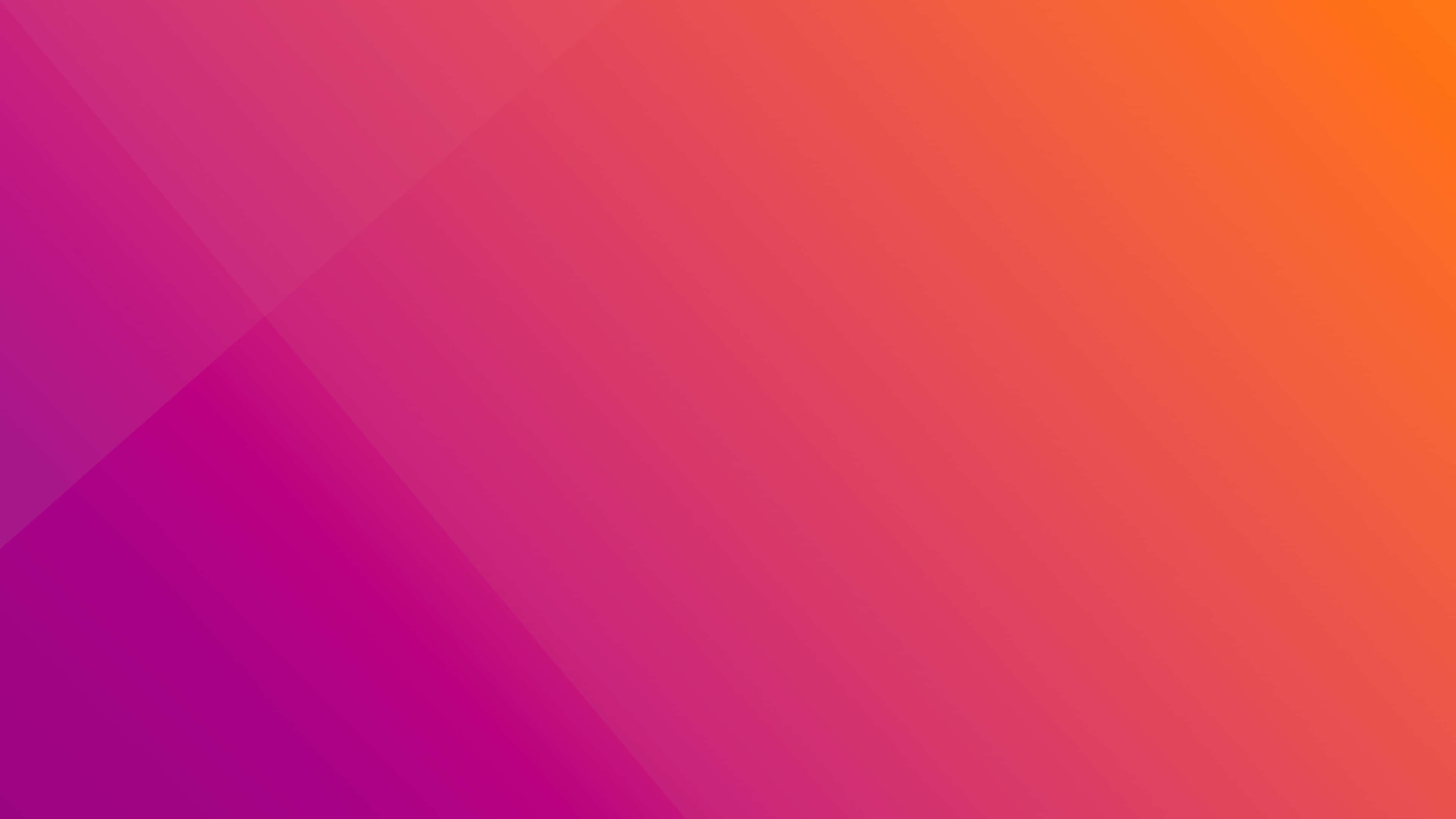 Ubuntu 4K 桌面背景 壁紙 — 充滿活力的漸變壁紙，從深洋紅色過渡到亮橙色，帶有柔和的對角線條紋。