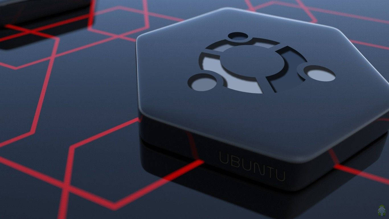 黑色六角形Ubuntu裝置，在反光表面上有紅色發光線條。