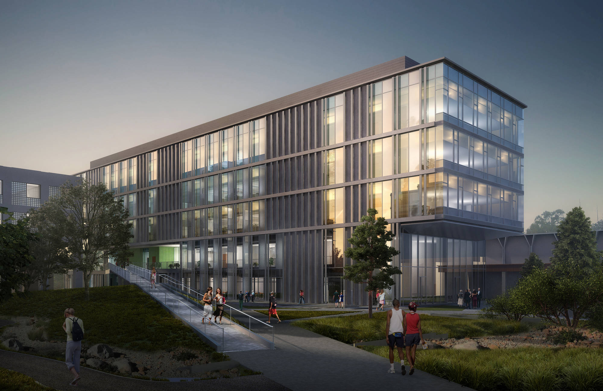 UCSD日落3D渲染圖 壁紙 — 現代玻璃和鋼結構建築在黃昏時亮起，人們在綠樹環繞的小徑和樓梯上行走。