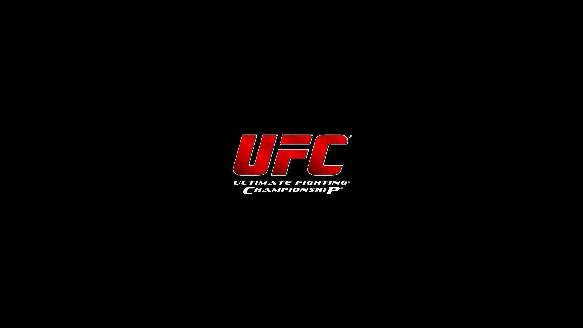 UFC 最簡約原版標誌 壁紙 — 大膽的紅色UFC標誌居中在鮮明的黑色背景上，下方有白色文字。