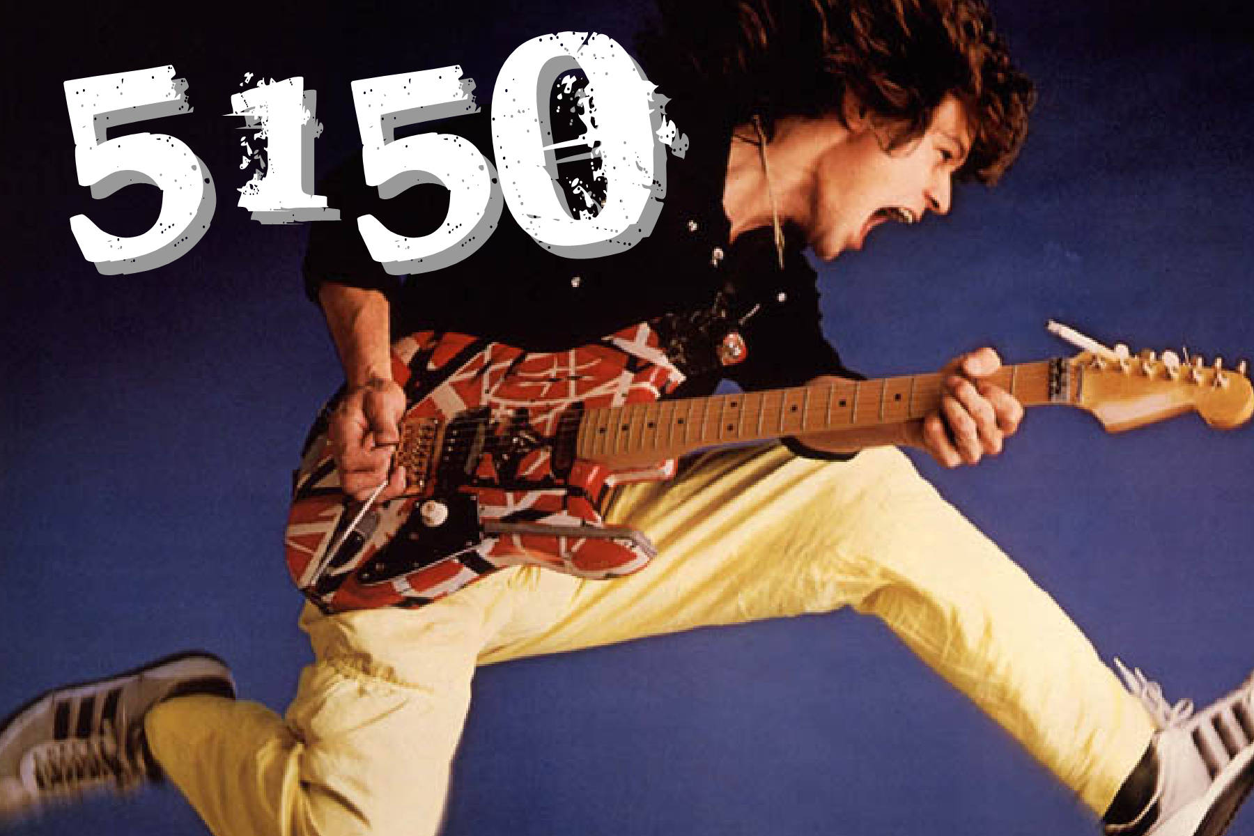 一位搖滾音樂家在半空中彈奏結他，帶有「5150」文字。 — 吉他 壁紙