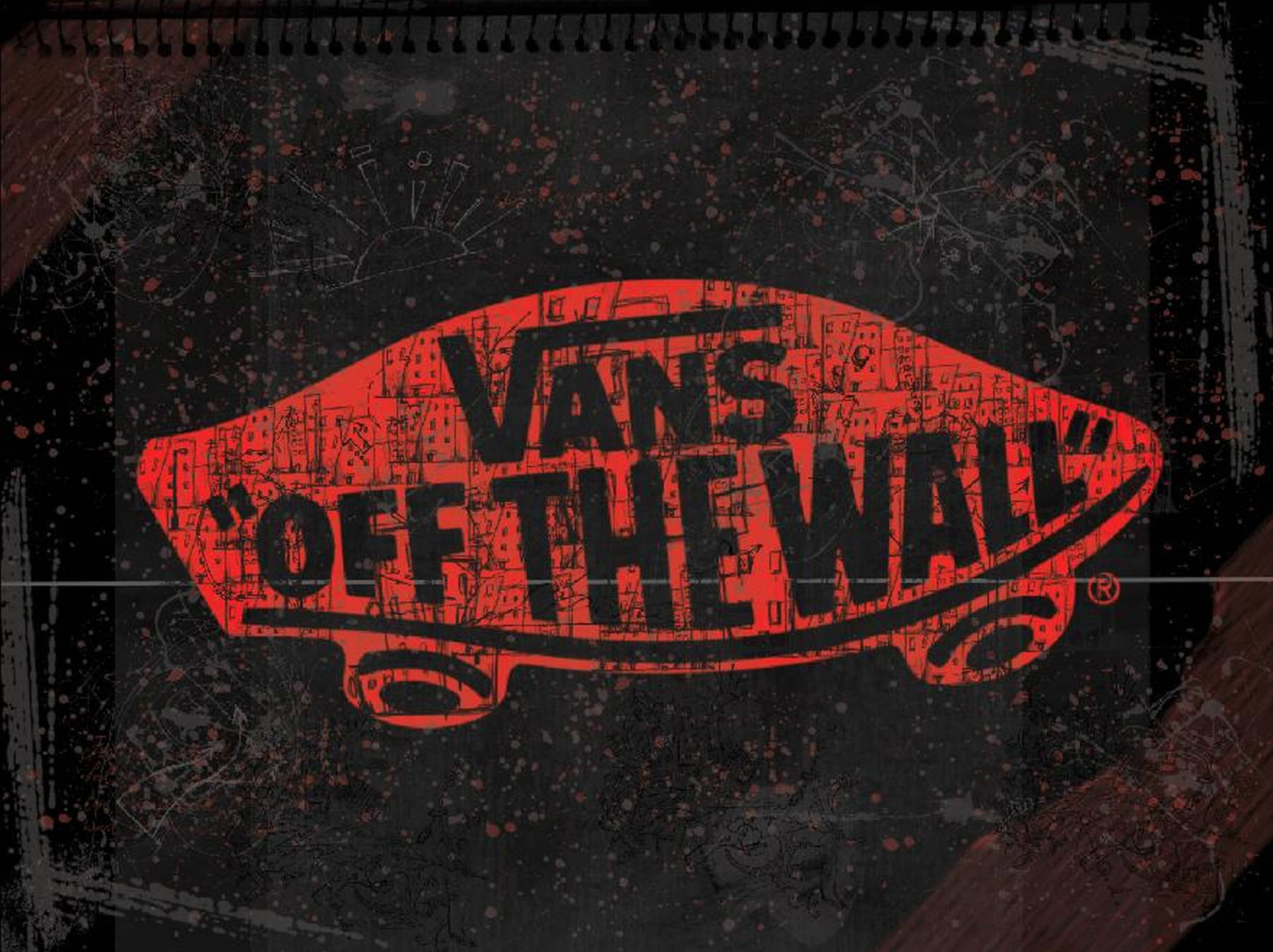 深色背景上帶有紅色油漆飛濺的Vans Off The Wall標誌。