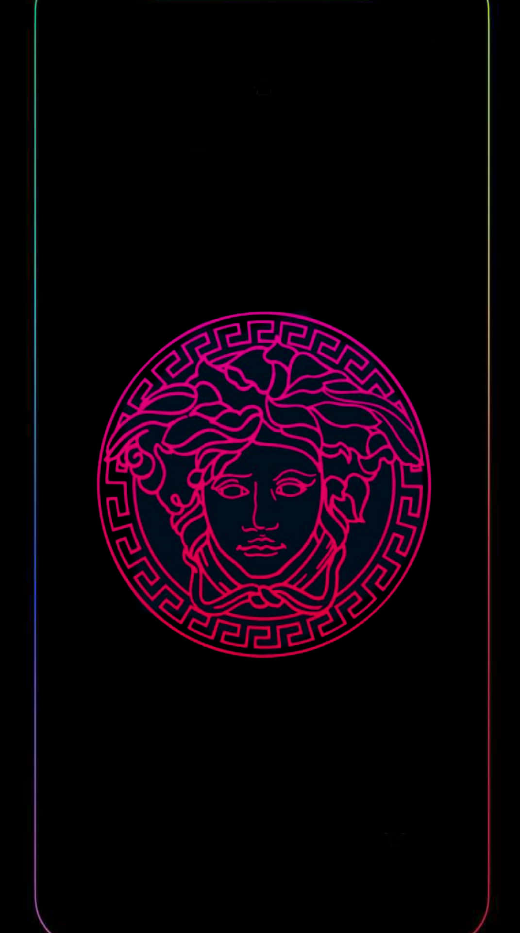 霓虹粉紅美杜莎標誌在黑色背景上，帶有彩虹邊框點綴。 — 粉紅色 iPhone 壁紙