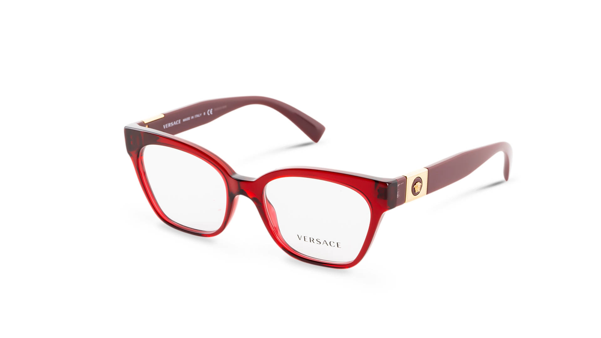 Versace VE3294F 388 眼鏡彰顯優雅品味 壁紙 — 紅色玳瑁Versace眼鏡，金色Medusa標誌及透明鏡片，白色背景。