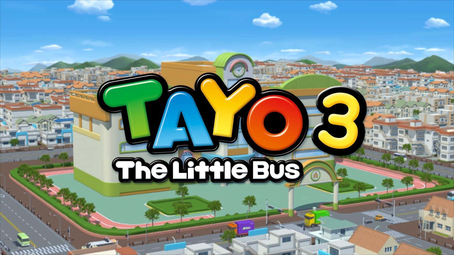  壁紙 — 充滿活力的卡通城市景觀， featuring Tayo the Little Bus 標誌，色彩繽紛的建築物和遠山，背景是明亮的藍天。