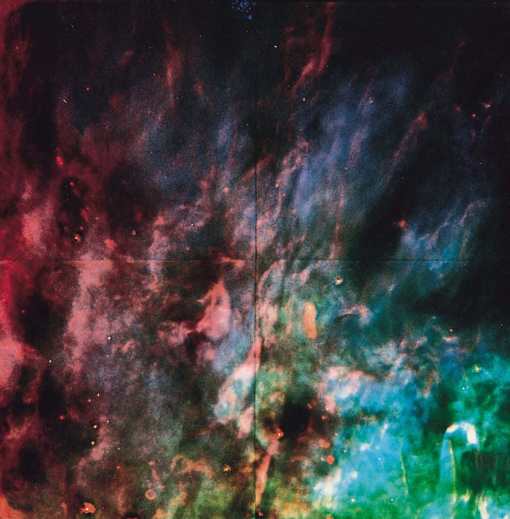 色彩繽紛的宇宙星雲，包含旋轉的氣體和遙遠的恆星。