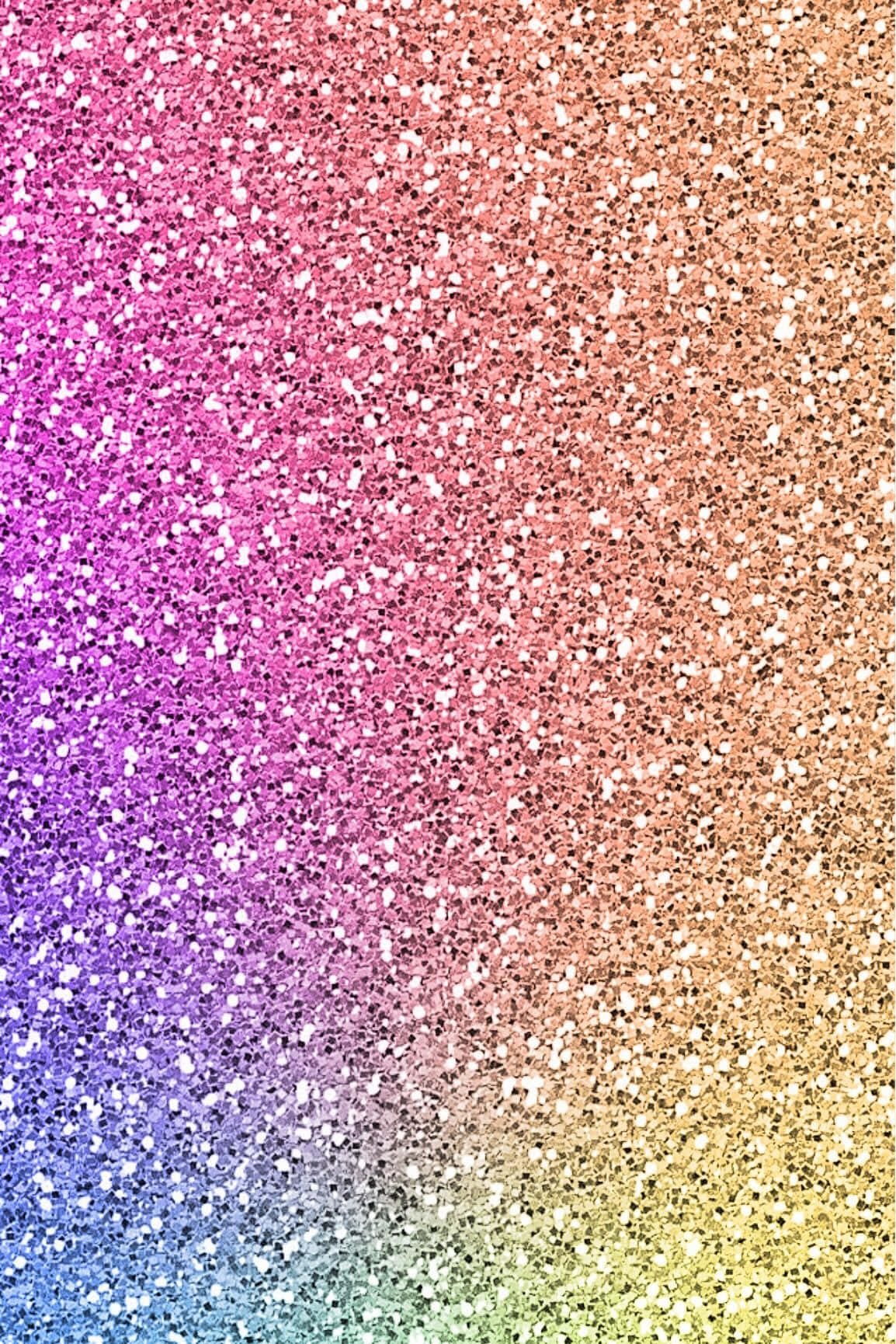 Rainbow Glitter 桌布 壁紙 — 充滿活力的閃粉漸變從紫色到金色，帶有捕捉光線的閃爍粒子。