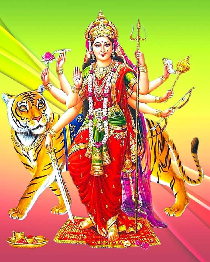  壁紙 — 一幅充滿活力的插圖，描繪印度教女神杜爾迦（Durga）多臂手持武器和蓮花，兩旁有兩隻老虎，背景為彩色漸變。