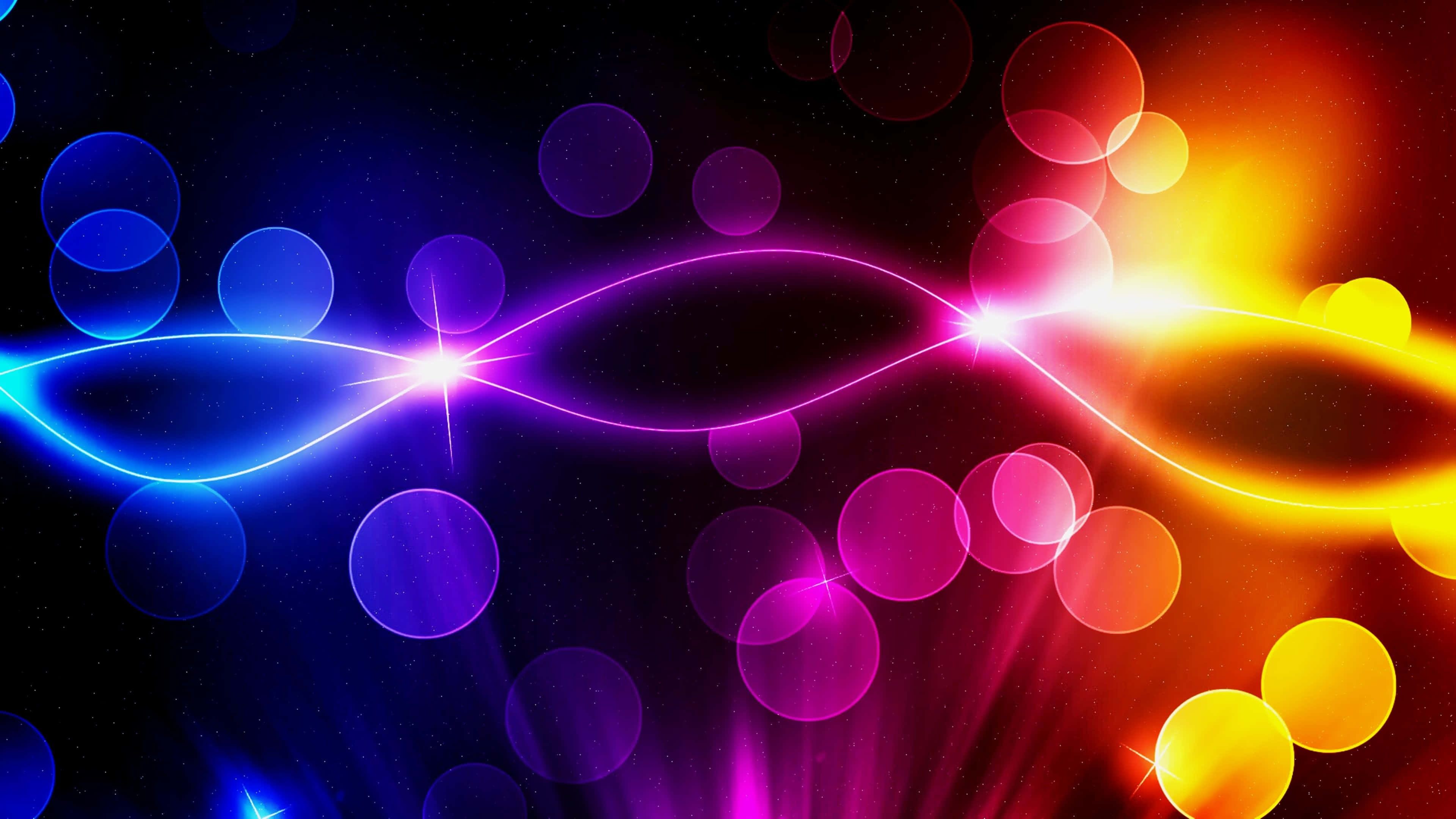 Abstract Neon 桌布 壁紙 — 充滿活力的霓虹燈軌跡在黑暗的宇宙背景上彎曲，點綴著發光的球體和星狀爆發。