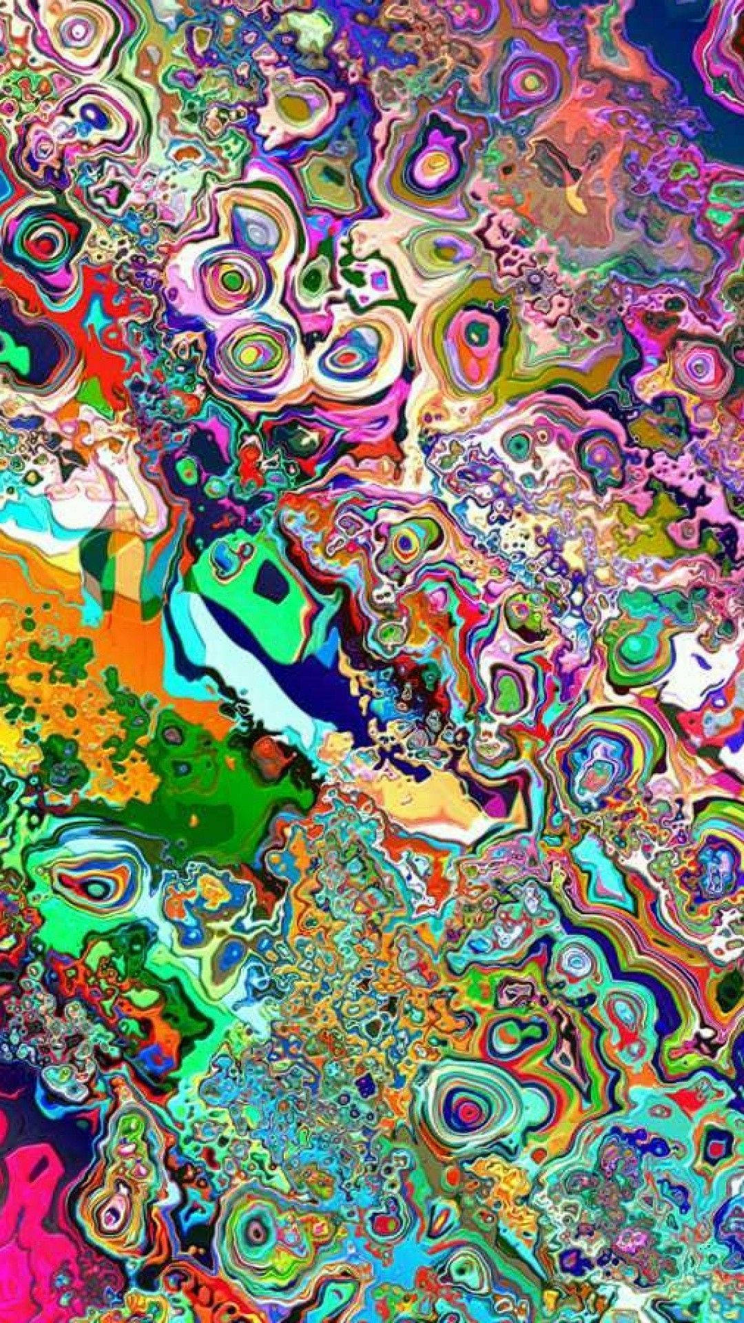 一幅萬花筒般的數位藝術作品，帶有旋轉的霓虹色彩和有機圖案。