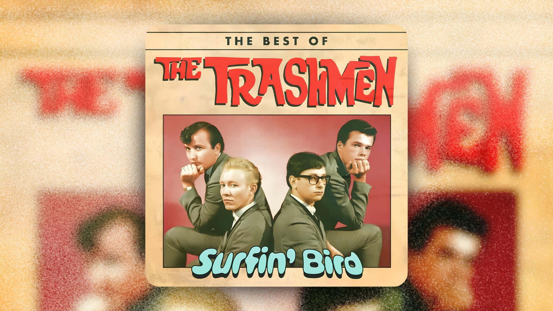  壁紙 — The Trashmen 的復古專輯封面，四位穿西裝的男士在紅色背景前擺姿勢，帶有 'Surfin' Bird' 文字。