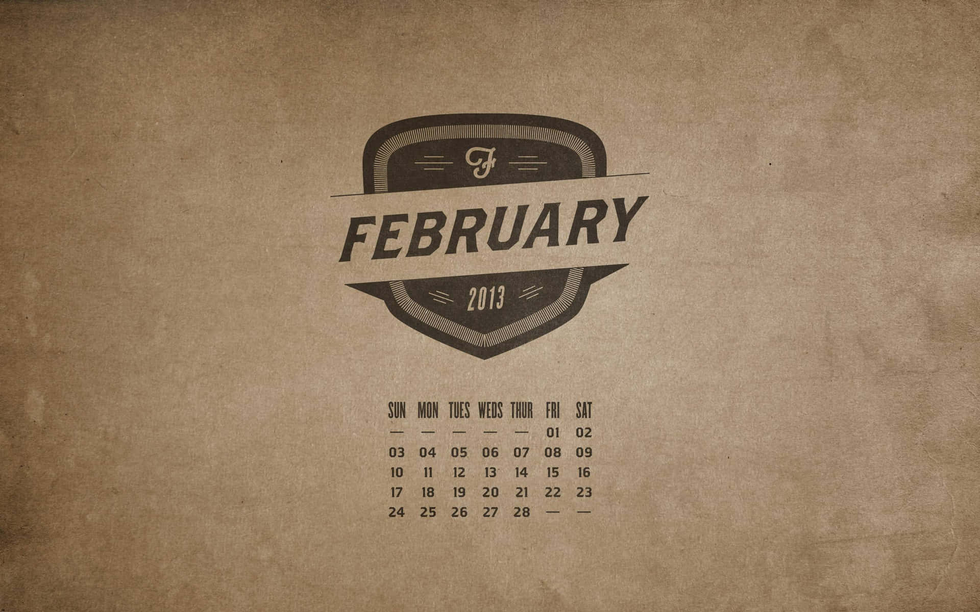 2013年2月月曆，帶有復古徽章，米色紋理背景。