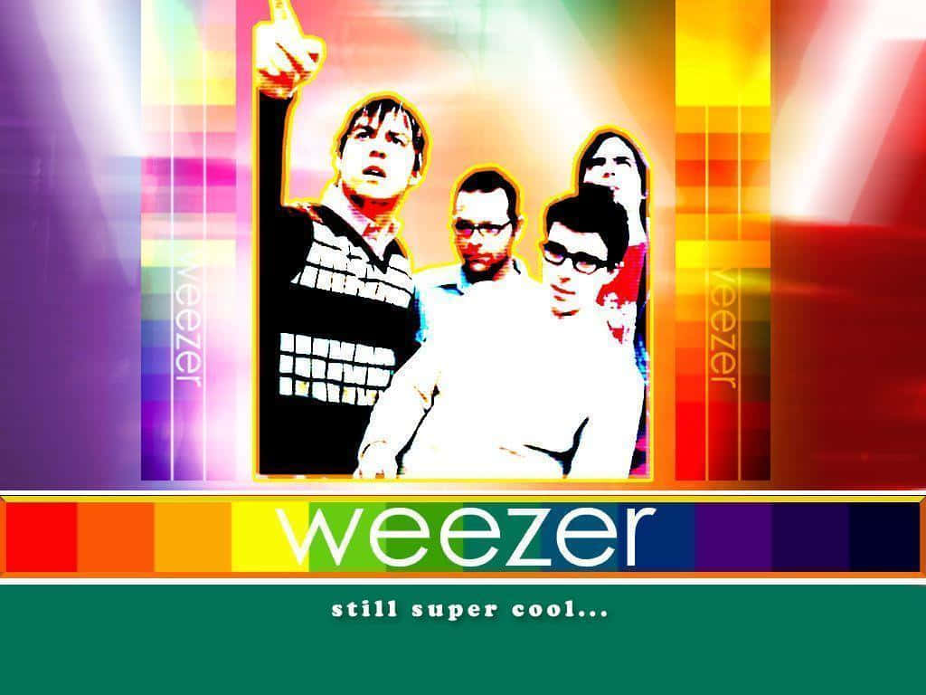  壁紙 — Weezer 樂隊的鮮明風格肖像，背景為絢麗彩虹漸變，帶有粗體文字。