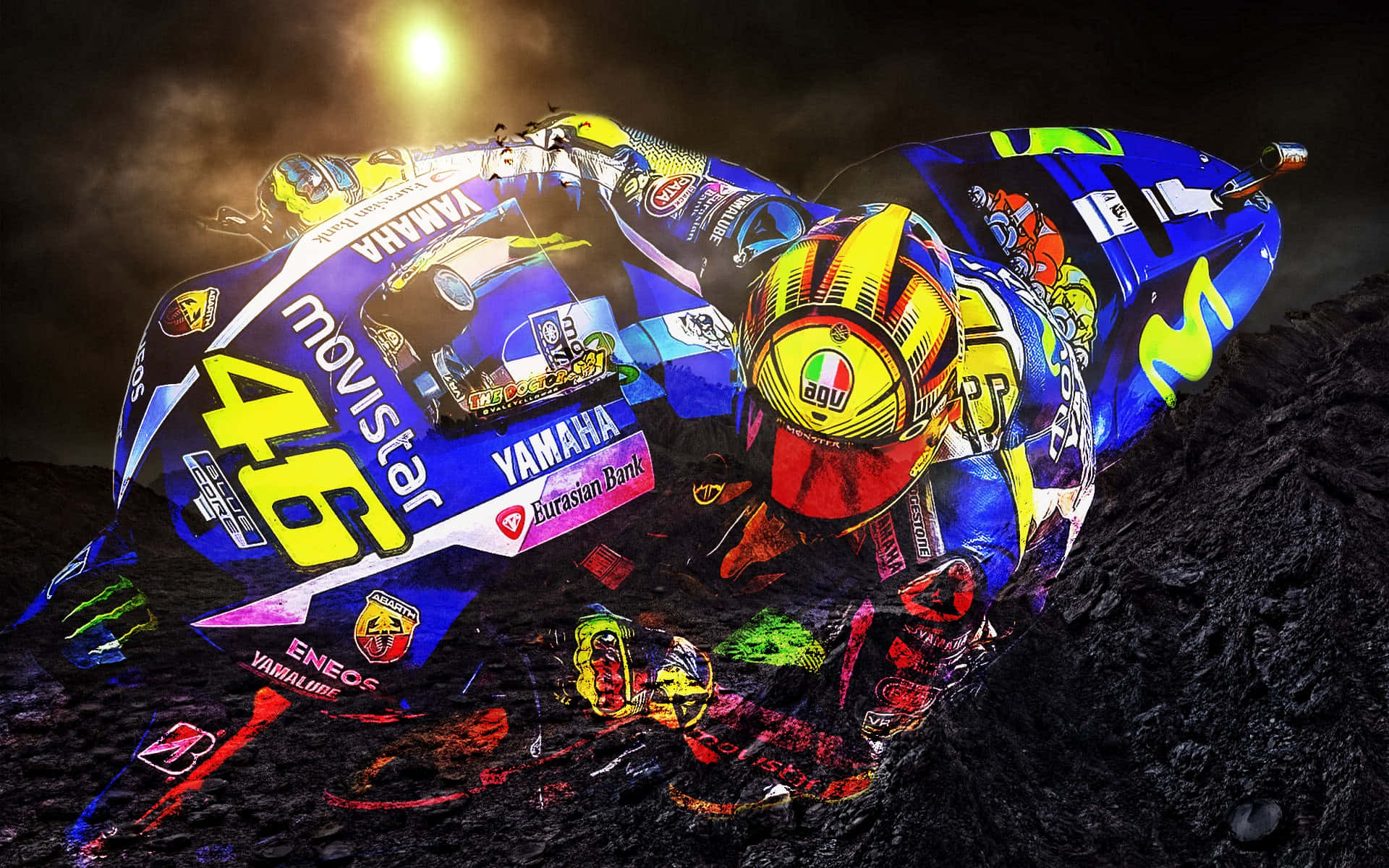 VR46 意大利車手 Valentino Rossi 的雅馬哈賽車 壁紙 — 一名身穿鮮藍色和黃色裝備的電單車手在明亮的聚光燈下，於黑暗的賽道上傾斜入彎。
