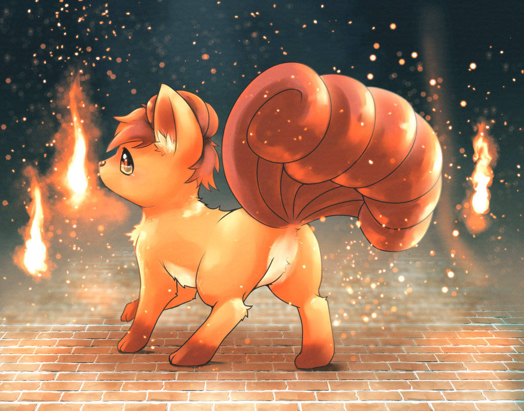 Vulpix 背景有火焰球 壁紙 — 一隻火熱的狐狸般生物，有著巨大的捲曲尾巴，站在磚地上，火焰和火花在黑暗環境中圍繞它舞動。