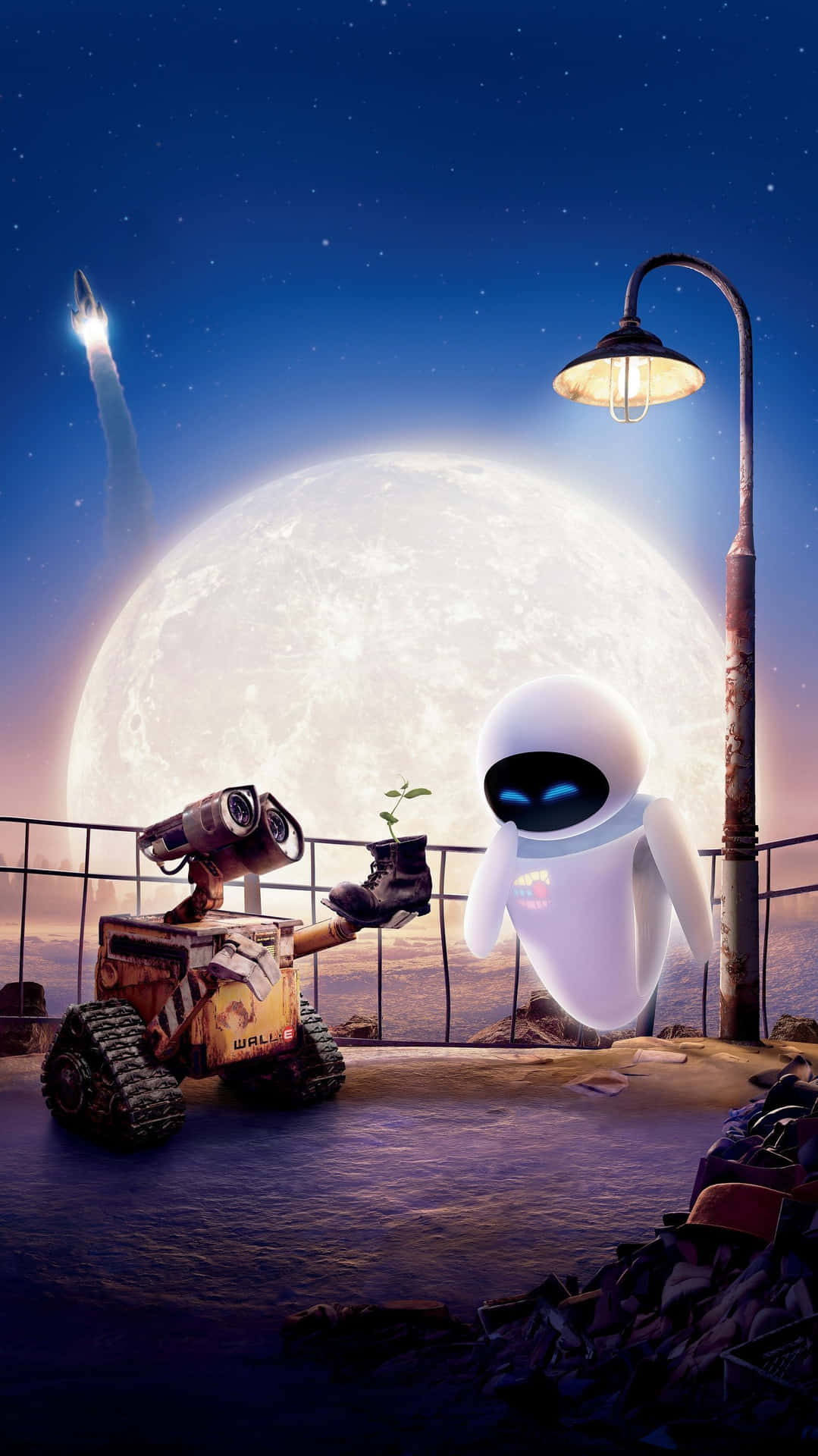Wall-E iPhone贈送Eve植物HD畫面 壁紙 — 兩個機械人在巨大月亮下分享溫馨時刻，火箭劃過繁星點點的夜空。