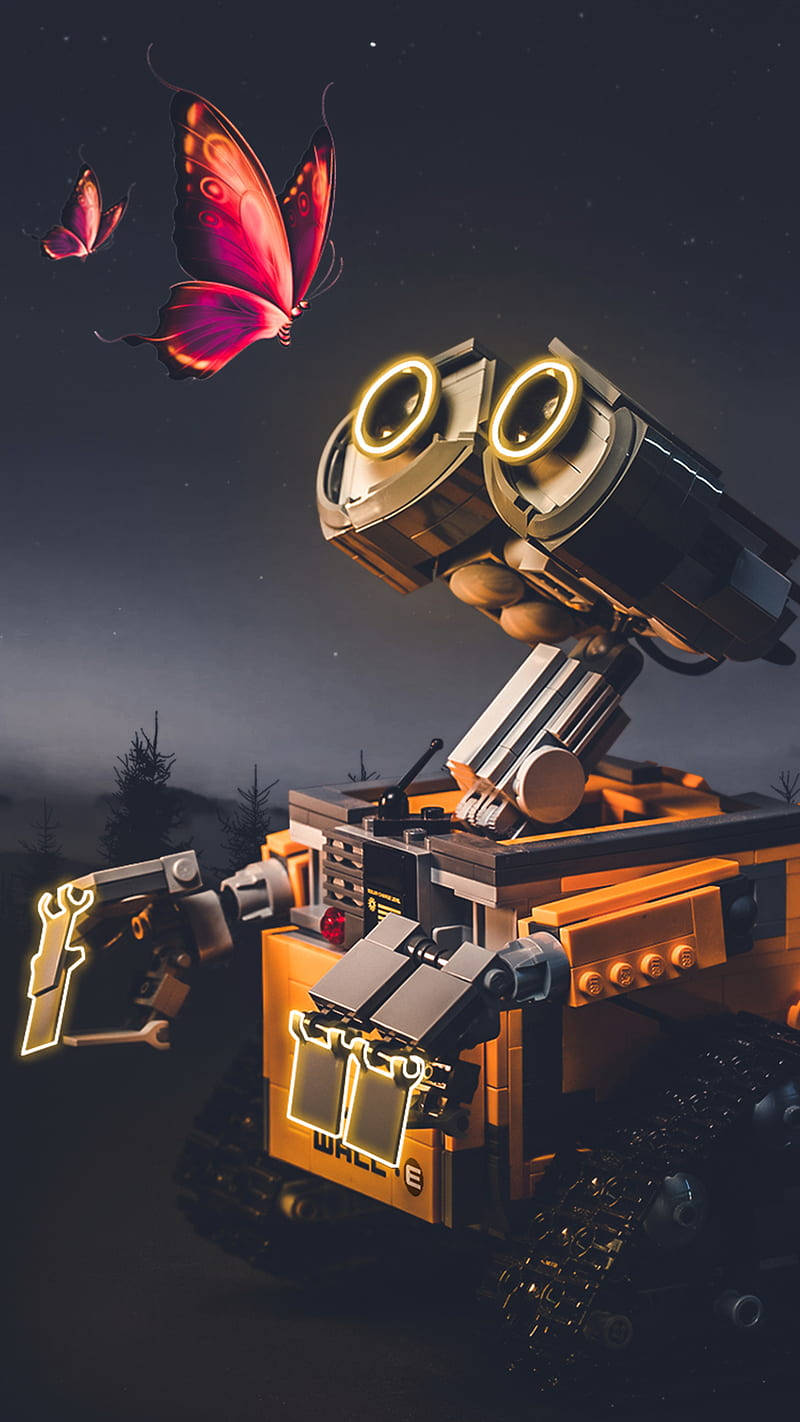 LEGO Wall-E機械人在星空下觀看粉紅色蝴蝶。