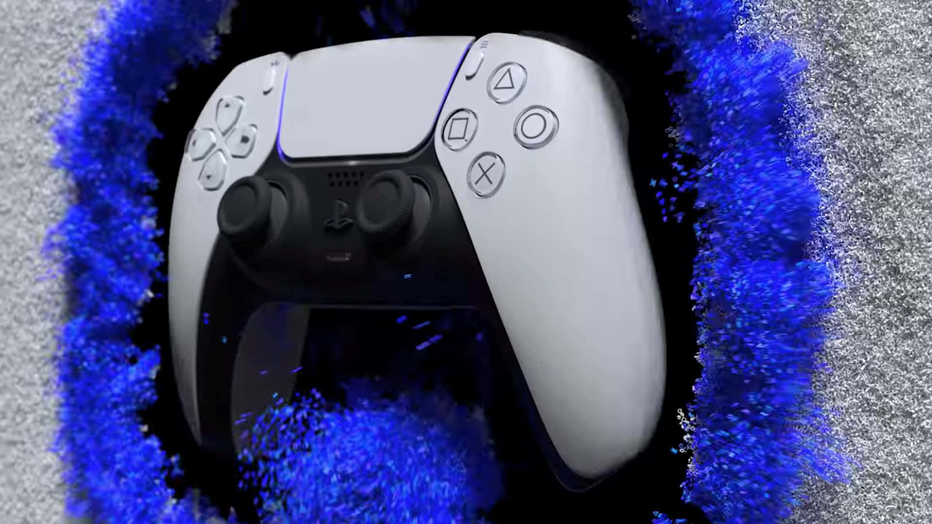  壁紙 — 白色PlayStation 5 DualSense控制器，被鮮豔的藍色粒子爆發包圍，背景為紋理灰色。