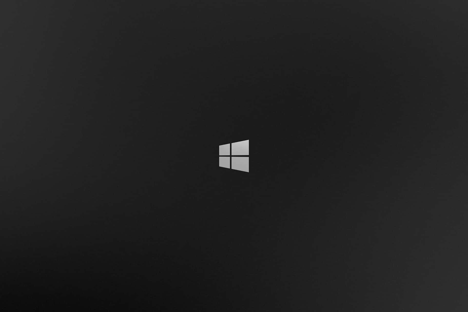 Windows標誌居中於深色漸變背景上