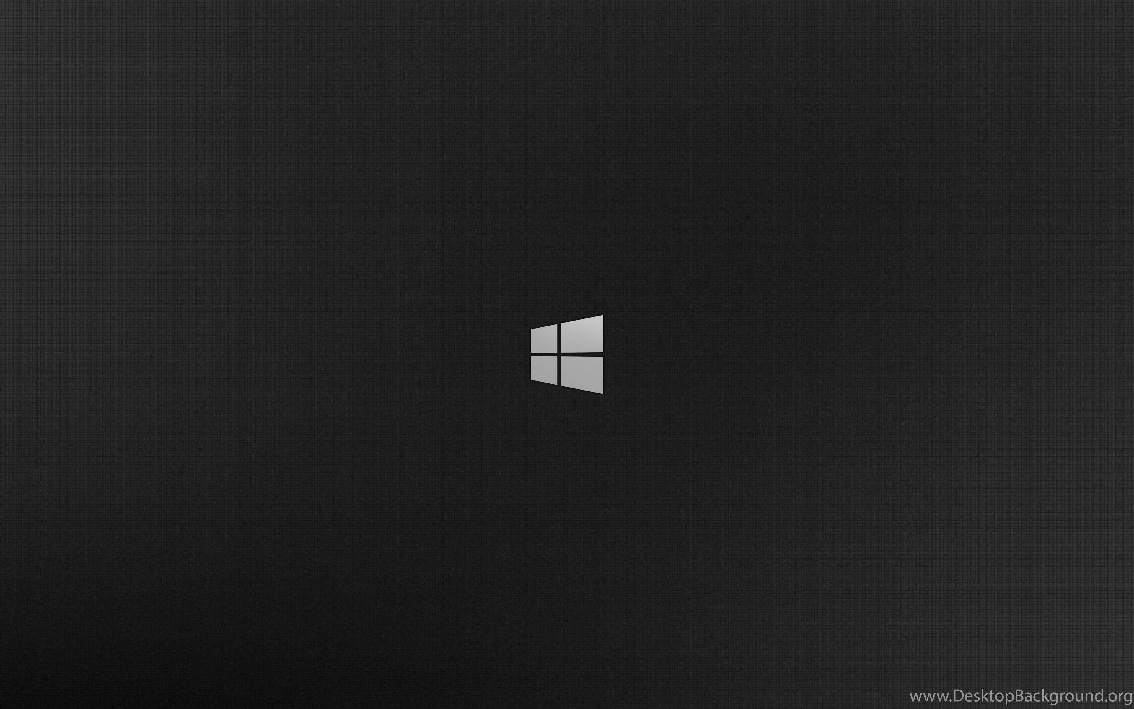 Windows 10 標誌 壁紙 — 極簡黑色桌布，中央帶有銀色Windows標誌，帶有微妙的漸變紋理。