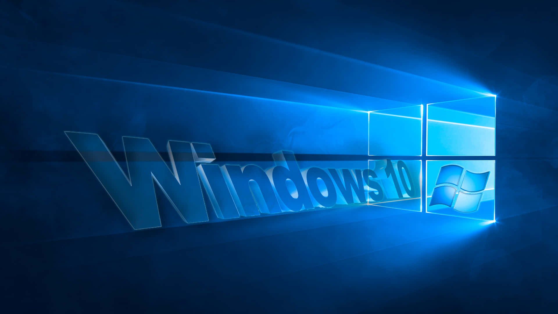 擁抱 Windows 10：PC 的未來 壁紙 — Windows 10 標誌在黑暗背景下透過玻璃窗發出鮮豔的藍光。