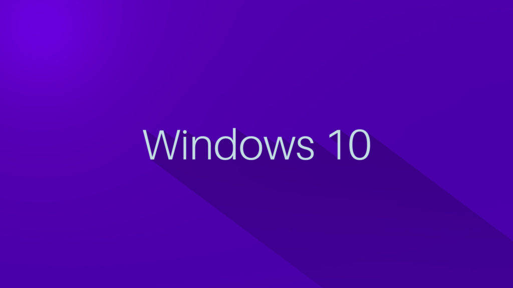 Windows 10 紫色桌面壁紙 壁紙 — Windows 10 標誌，白色文字，在紫色漸變背景上帶有長陰影。