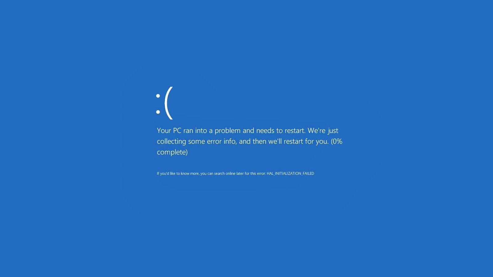 Windows PC錯誤畫面，帶有悲傷表情和重新啟動訊息