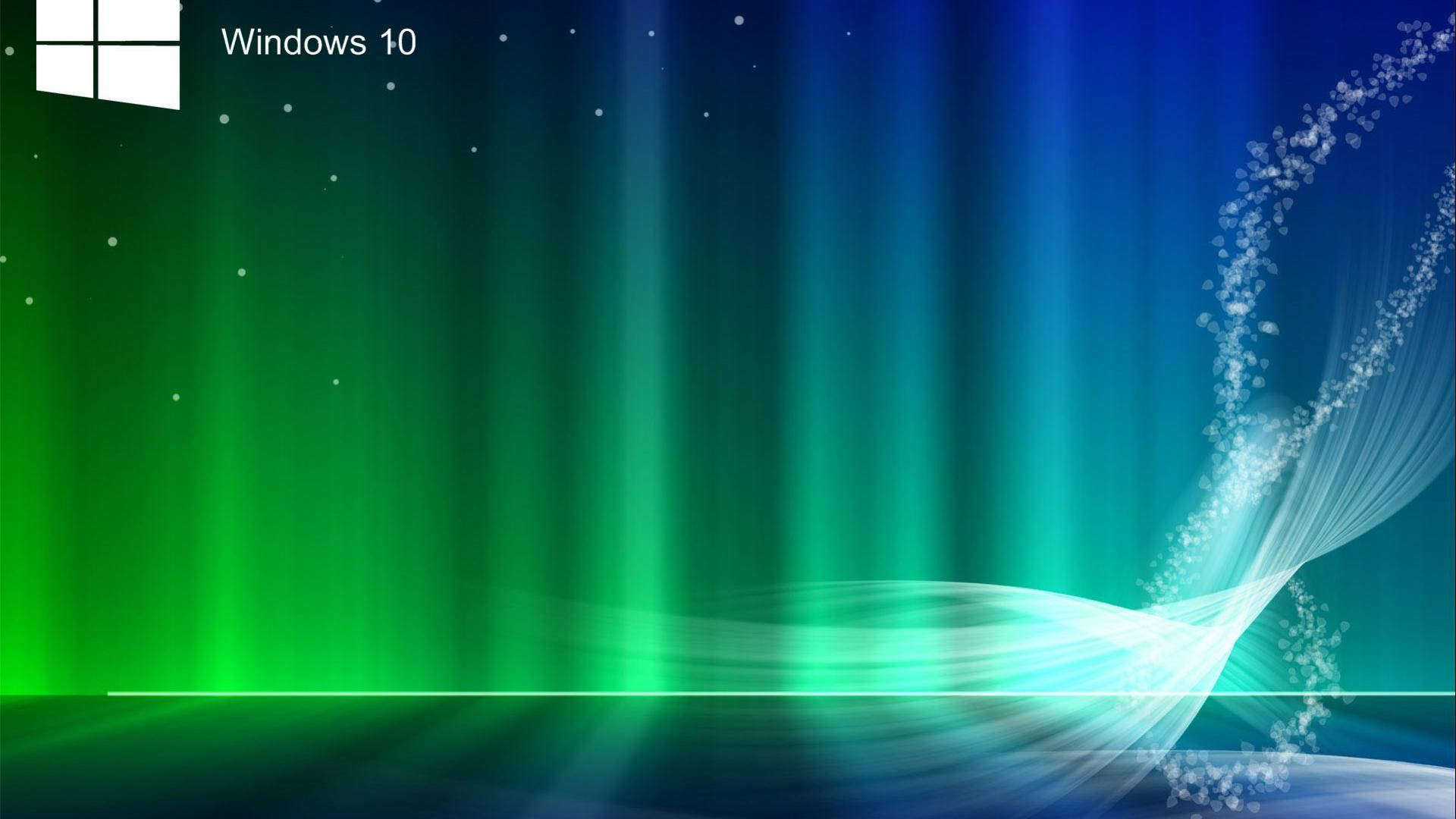 Windows 10 高清極光 壁紙 — 充滿活力的綠色和藍色光束在數位虛空中傾瀉而下，伴隨著旋轉的粒子軌跡和漂浮的點。