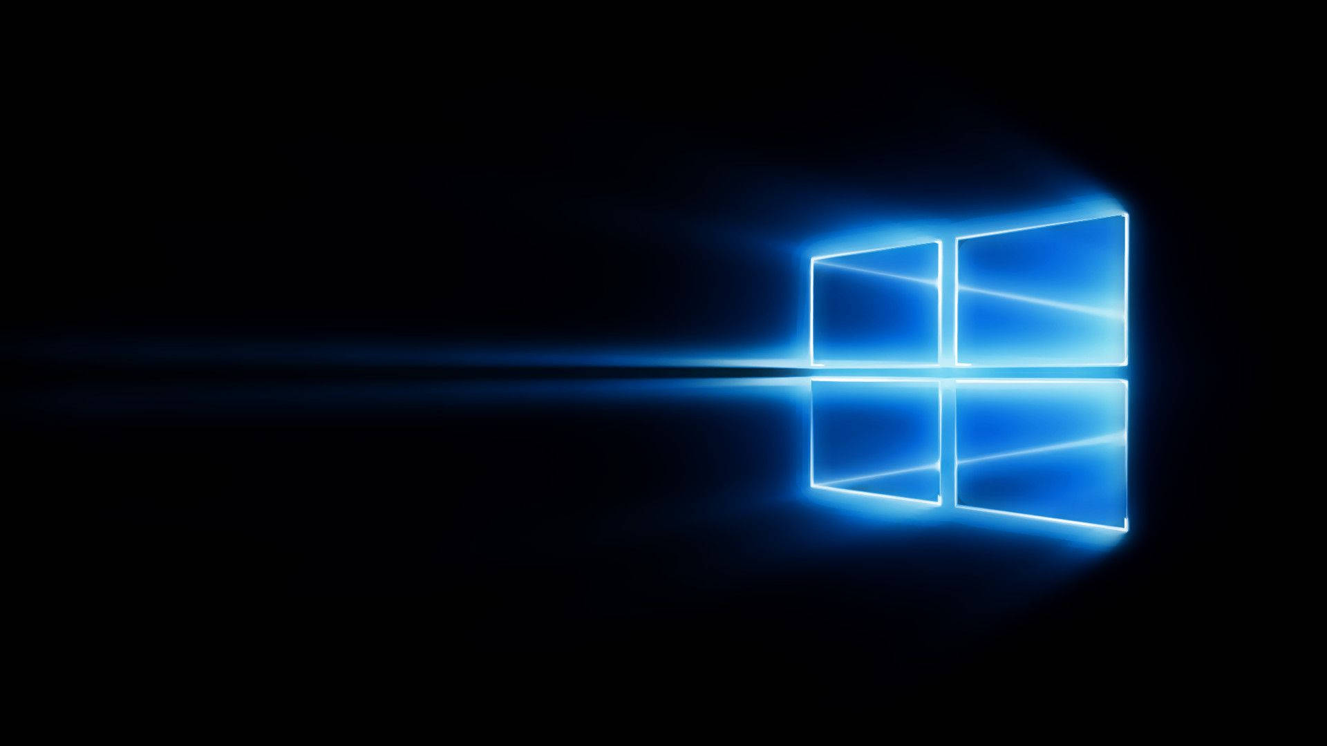 Windows 10 高清藍光標誌 壁紙 — 發光的藍色Windows標誌在黑暗背景上閃耀，帶有鏡頭光暈效果。