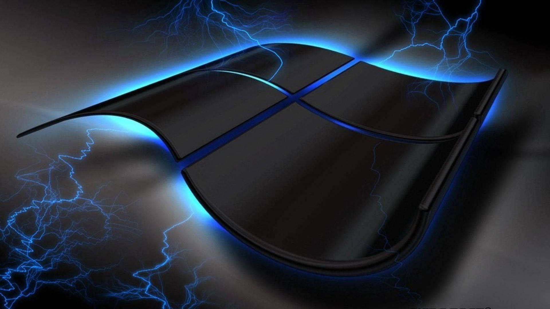 Windows 10 高清飄浮黑色標誌 壁紙 — 一個時尚的黑色Windows標誌在深色背景上發出電光藍色的閃電光芒。