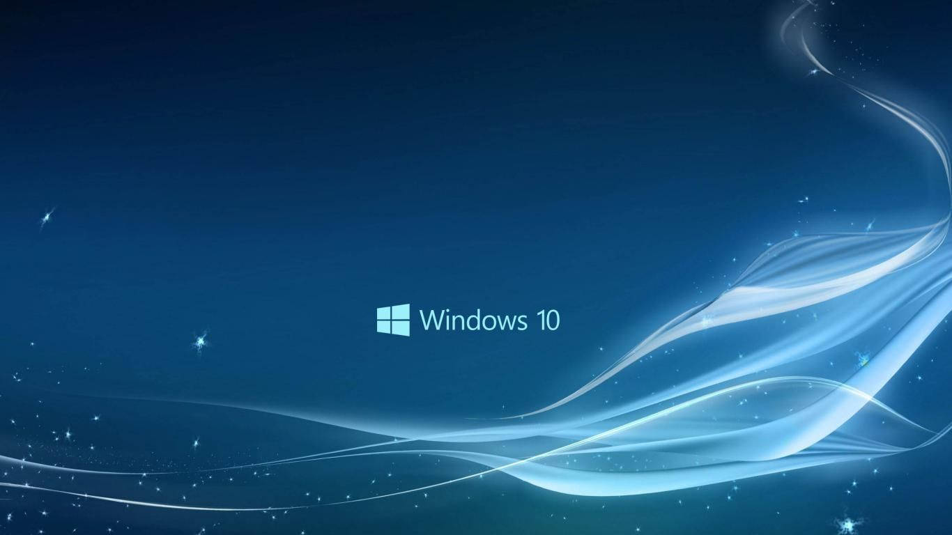 Windows 10 高清魔法光暈 壁紙 — Windows 10 標誌置於深藍色背景中央，帶有發光的白色波形和閃爍的星星。