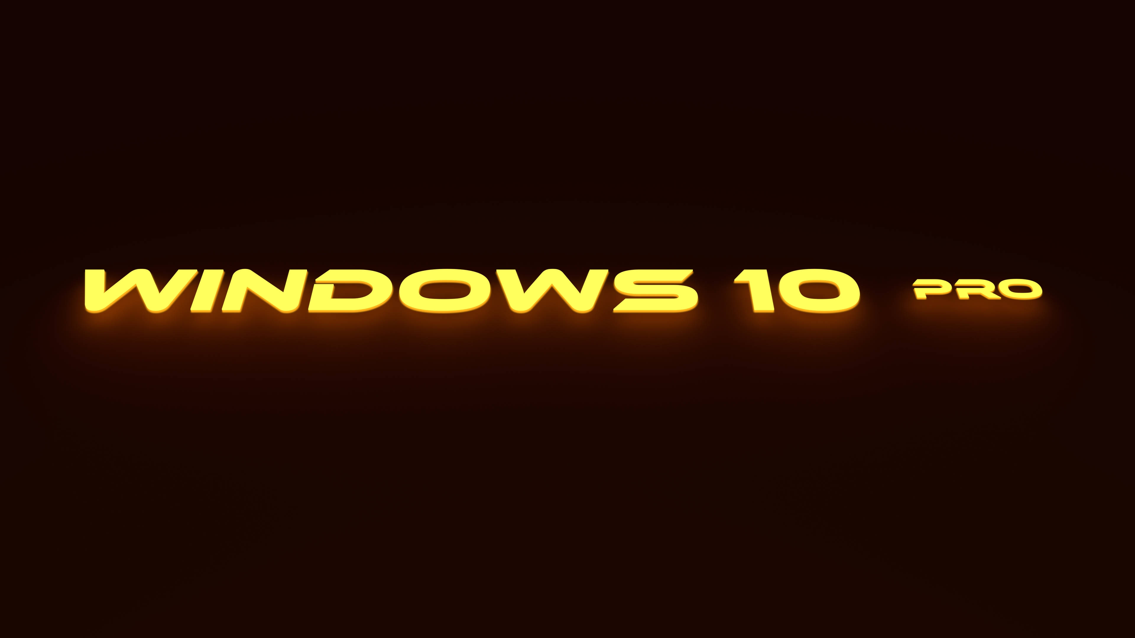 Windows 10 高畫質專業版 壁紙 — 發光的金色 Windows 10 Pro 文字在黑暗背景上漂浮，帶有柔和環境光。