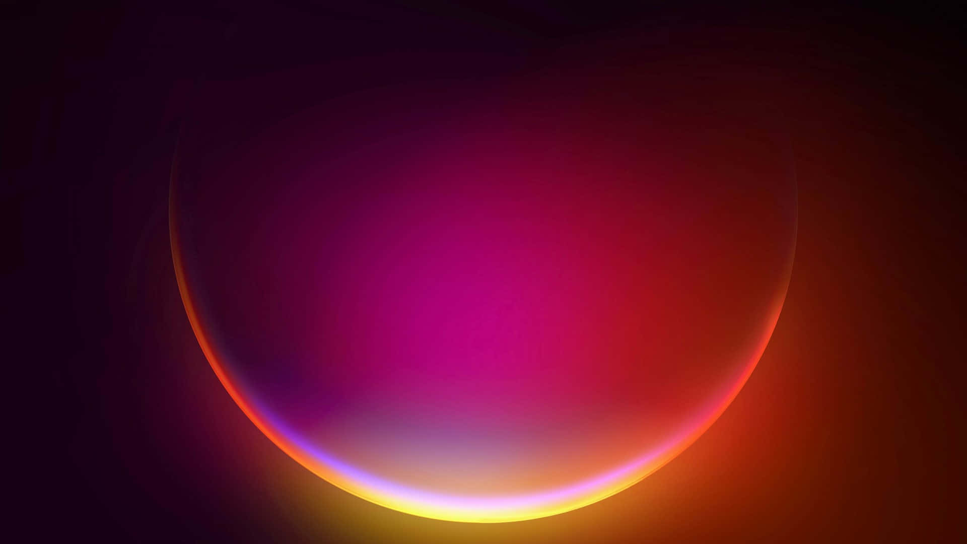 Windows 11 3D 圓圈 壁紙 — 一個發光的漸變球體在深色背景上散發出洋紅色、橙色和黃色的溫暖色調。
