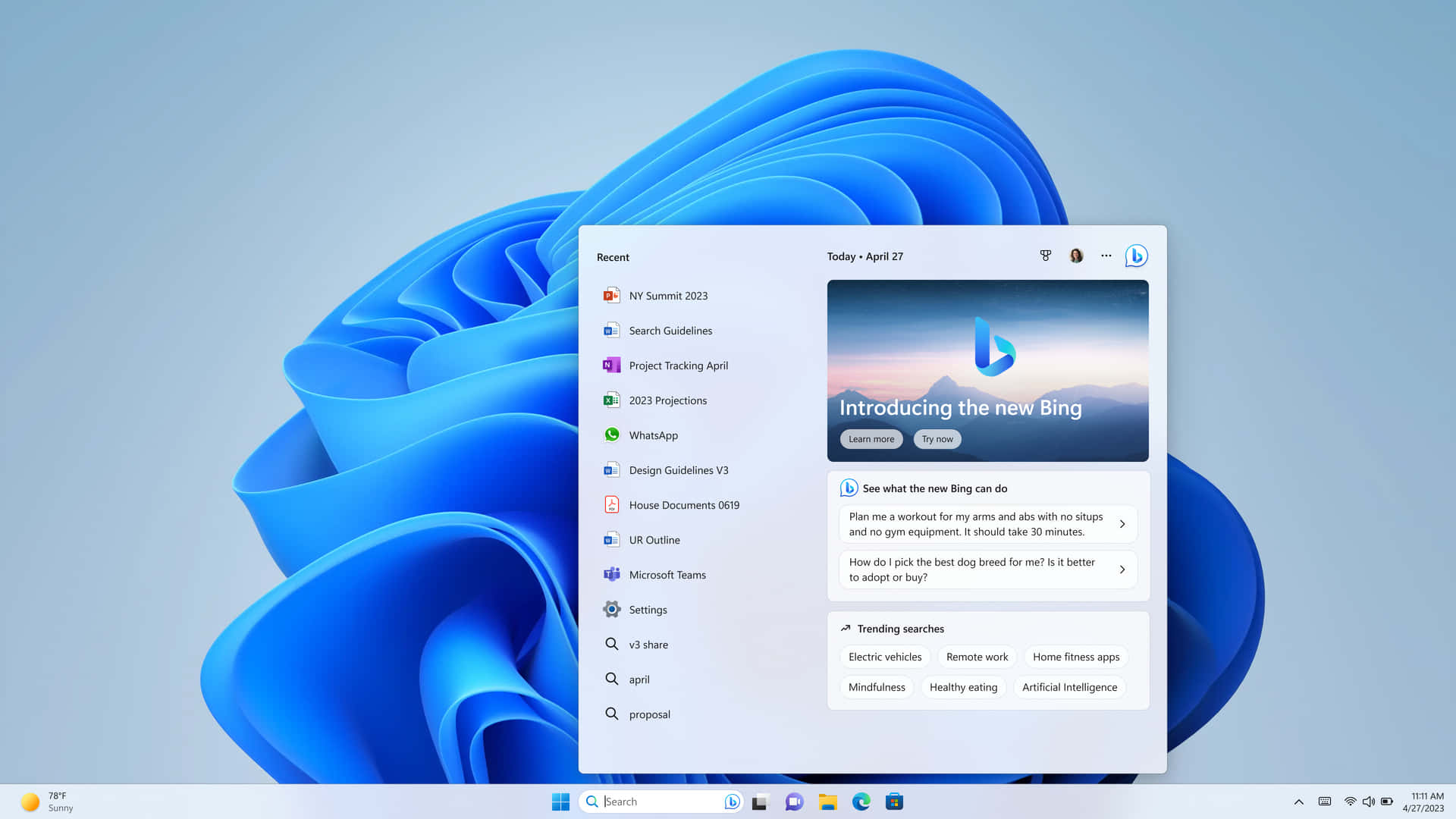 Windows 11 桌面，帶有藍色波浪背景和啟用的 Bing 搜尋視窗。