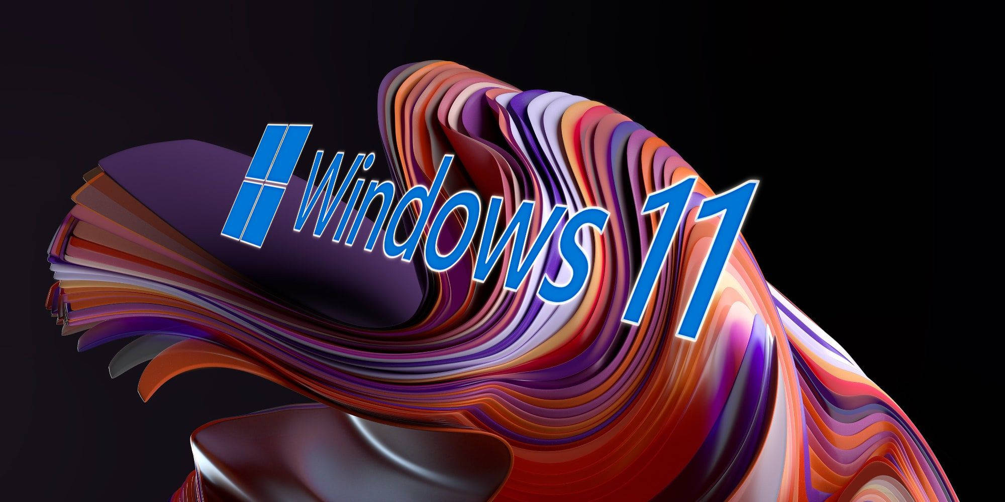Windows 11 圖形藝術 壁紙 — Windows 11 標誌從一條充滿活力的多色漸變漩渦絲帶中浮現，背景為深色。