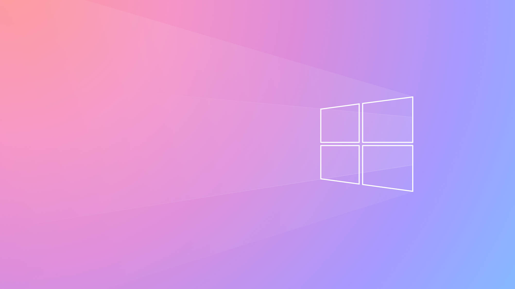 Windows 11 粉紫漸層 壁紙 — 一個簡約的Windows標誌在粉紅、紫色和藍色的柔和漸變背景上發出白色光芒。