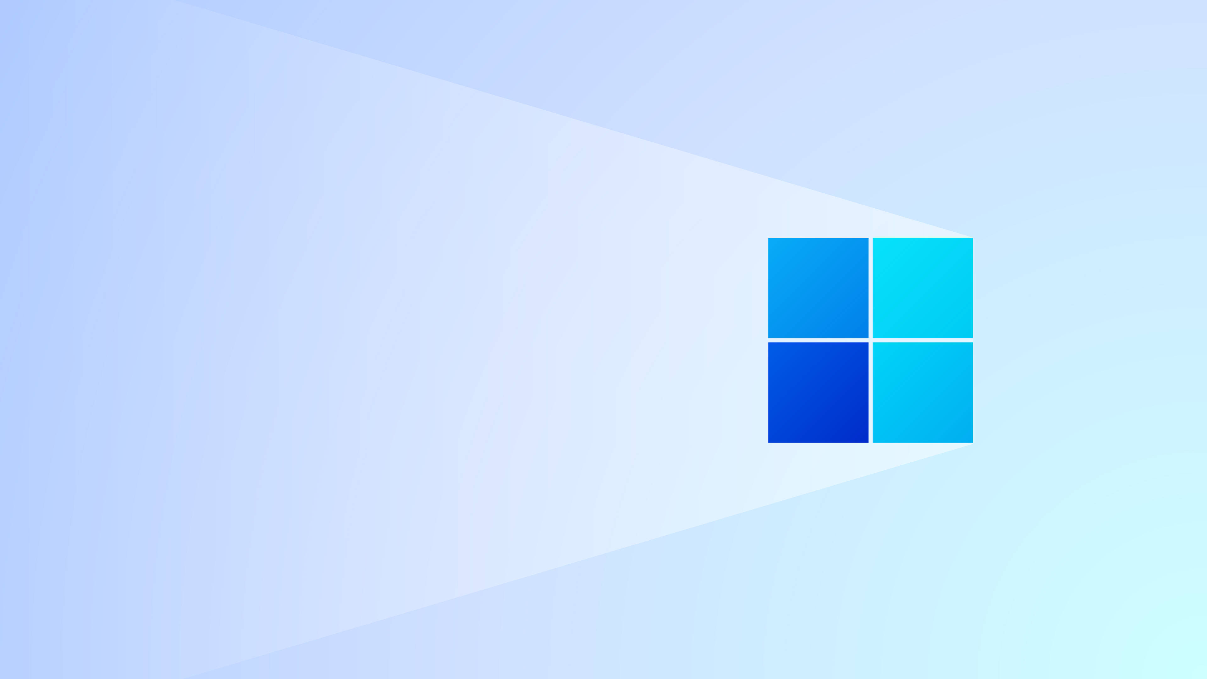 Windows 11 藍色標誌 壁紙 — 一個Microsoft Windows標誌，由漸變藍色方塊組成，置中於柔和的淺藍色背景上，並帶有對角光線。