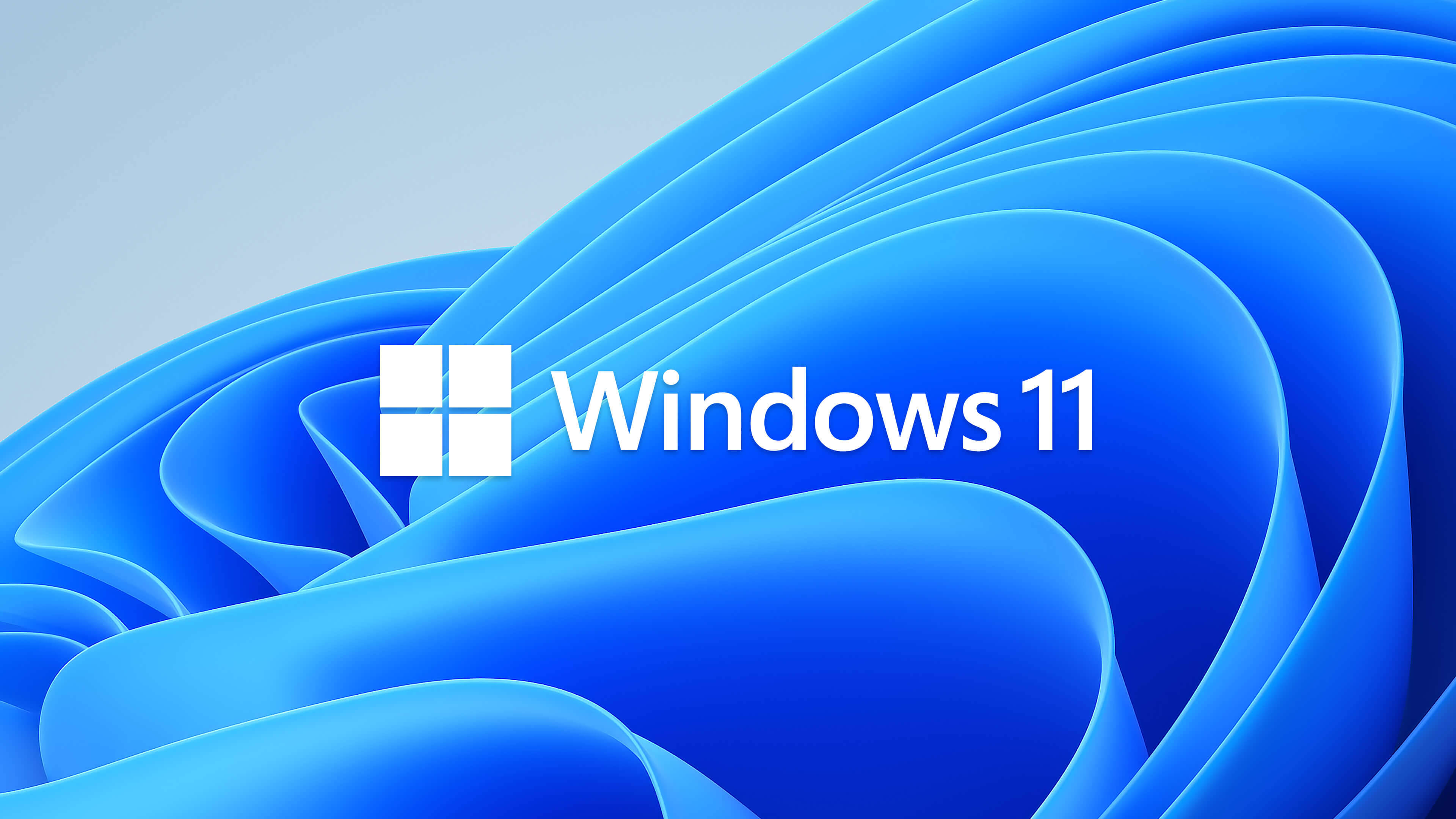Windows 11 藍色花紋 壁紙 — Windows 11 標誌居中於動態藍色波浪背景上，帶有柔和漸變。